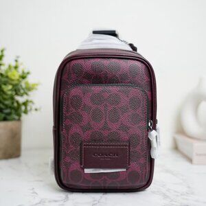 Coach CV763 Racer Sling Pack In Signature Canvas Black Currant NWT